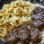 Tender Garlic Butter Steak with Cheesy Alfredo Tortellini
