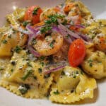 Ravioli with Seafood, Spinach & Mushrooms in Garlic Cream Sauce