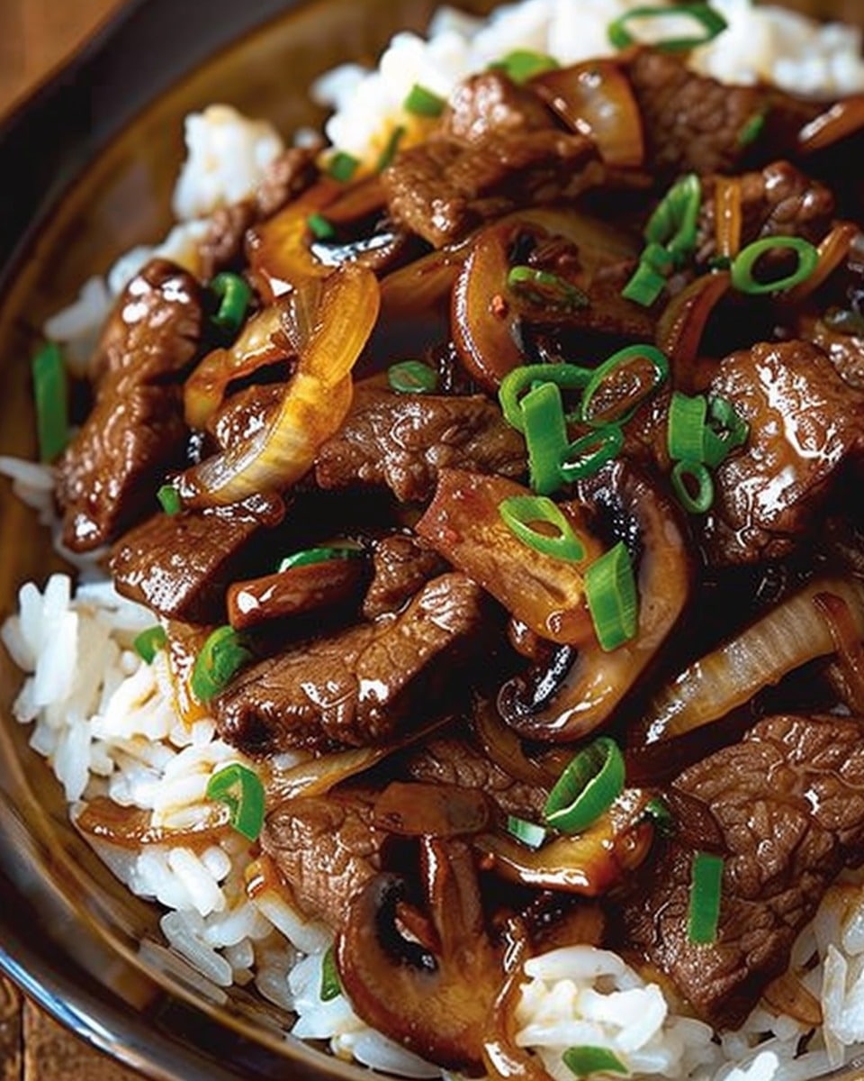 Beef, Onion & Mushroom Stir-Fry Over Rice