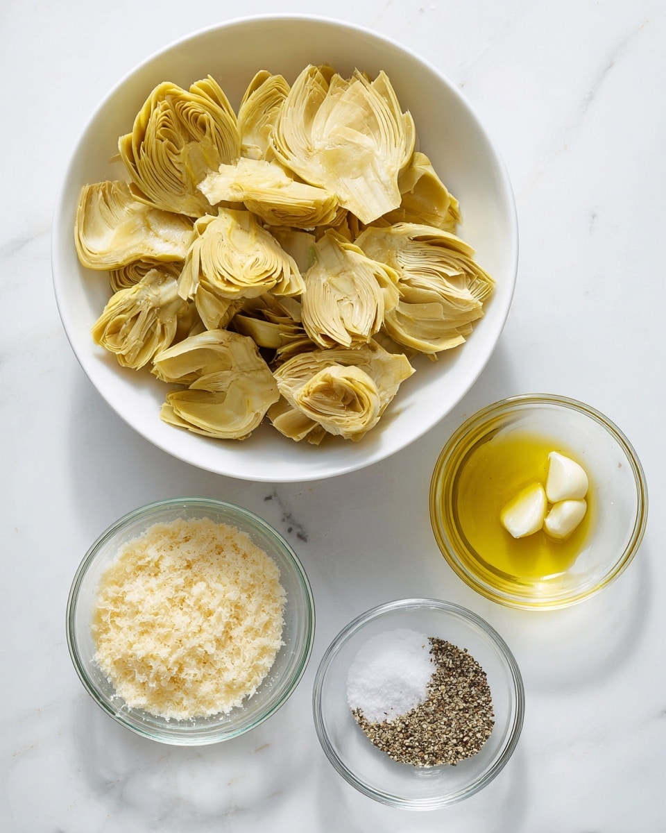 A white bowl filled with pale yellow heart artichoke pieces sits in the top left corner of a white marbled surface, showing the artichokes' layered, fibrous texture. Below the bowl are three small clear glass bowls arranged in a rough triangle: the largest bowl contains finely grated light beige cheese, the medium bowl holds a golden yellow olive oil, and the smallest bowl has chopped white garlic. At the bottom right is a small clear glass bowl divided into two halves, one side with coarse white salt and the other side with crushed black pepper. The overall composition is clean, bright, and minimalistic. photo taken with an iphone --ar 4:5 --v 7