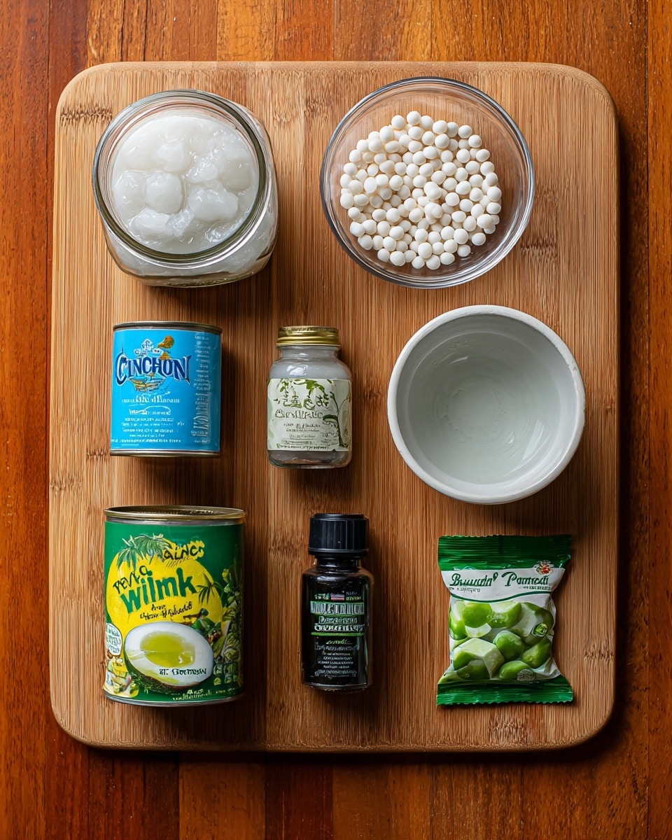 The image shows a wooden board with several cooking ingredients neatly arranged on it. At the top left, there is a clear glass jar filled with white coconut jelly, next to a small clear glass bowl containing small white tapioca pearls. To the right, there is an empty white bowl labeled as water. Below these, there is a small can of table cream in the center, with a small dark green bottle of buko pandan extract to its right. At the bottom left corner, a can of condensed milk with a blue label and next to it, a can of young coconut pulp with green and yellow colors. On the bottom right, a packet of buko pandan jelly mix featuring a green jelly dessert image on the package. The entire setup is on a wooden surface with a warm tone. photo taken with an iphone --ar 4:5 --v 7