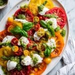 Burrata Salad with Heirloom Tomatoes, Basil Pesto, and Fresh Herbs Recipe