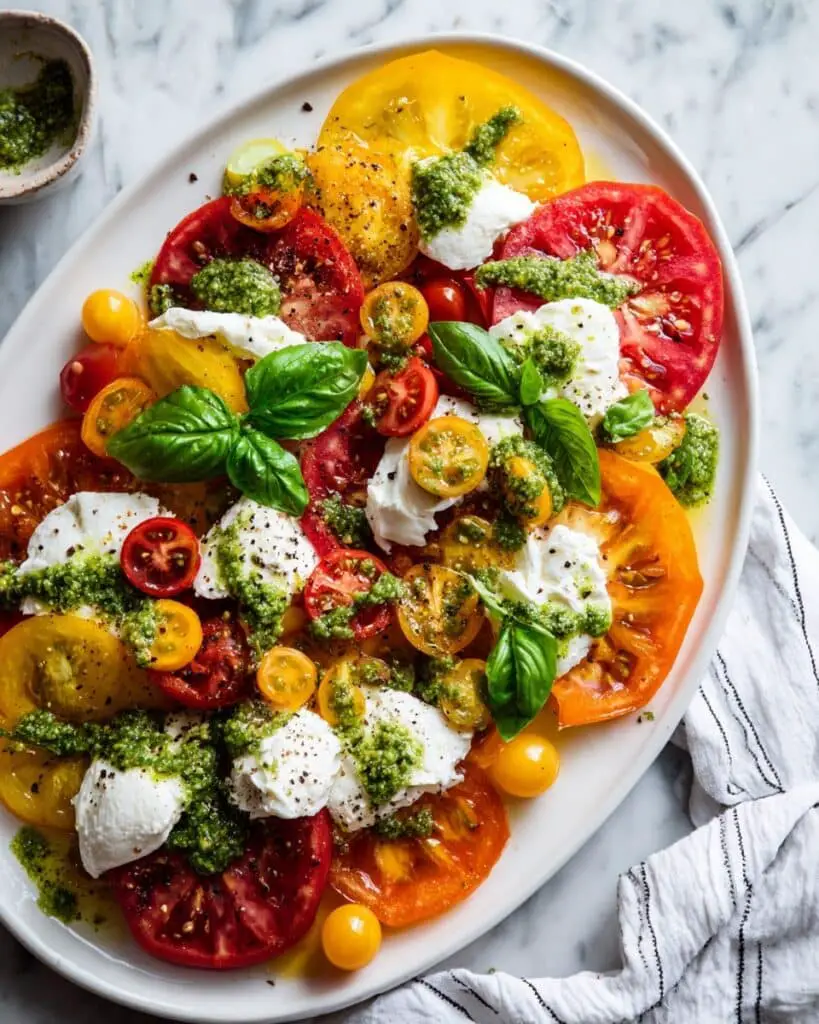 Burrata Salad with Heirloom Tomatoes, Basil Pesto, and Fresh Herbs Recipe
