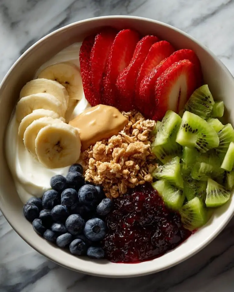 Peanut Butter Jam Yogurt Bowl with Granola & Berries Recipe