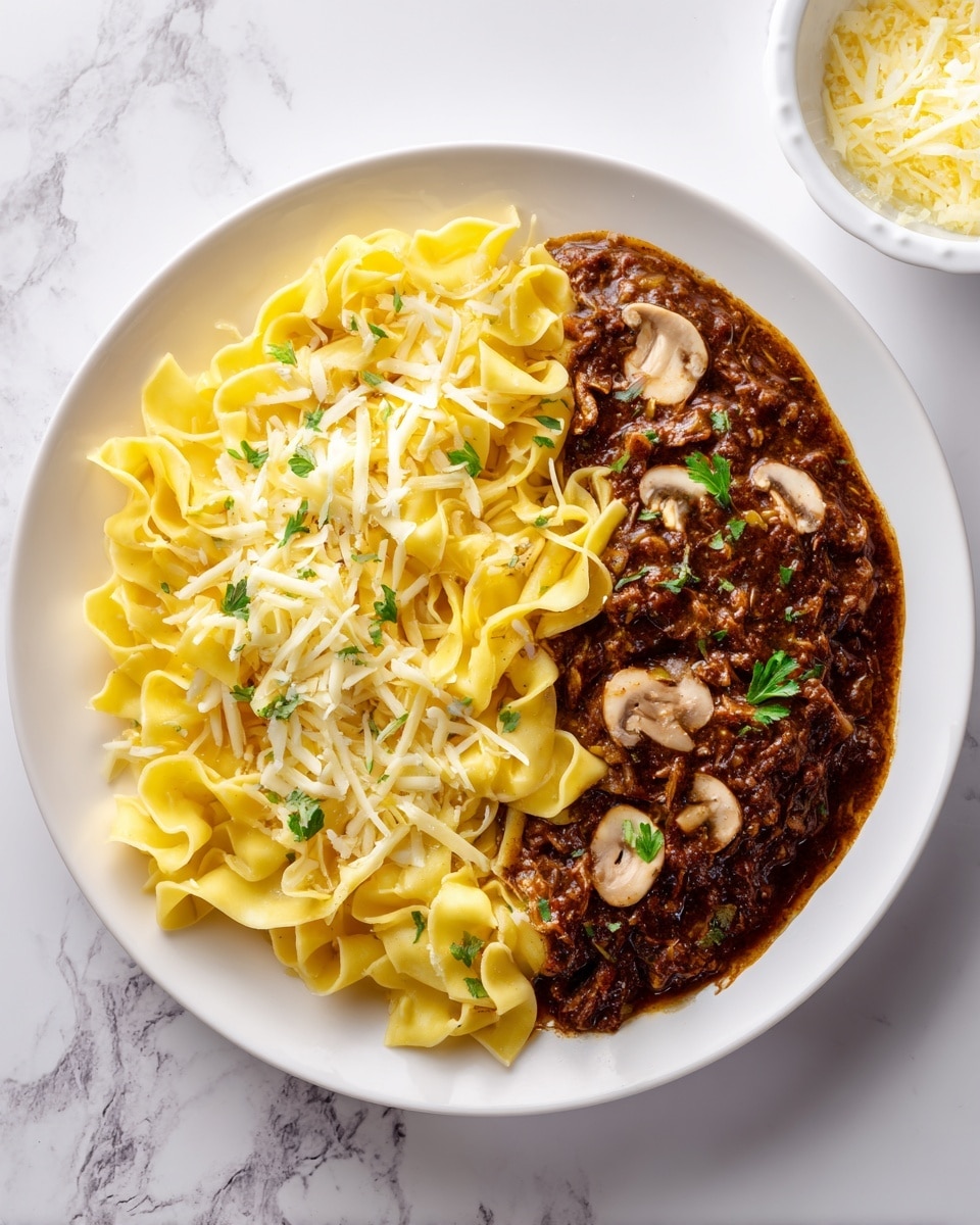 The dish shows wide, flat, yellow pasta noodles folded and layered in a white bowl. On top and between the noodle layers is a thick, dark brown meat sauce with small chunks and bits of mushroom adding texture. The dish is sprinkled with a thin layer of shredded white cheese and small green herb leaves scattered on top. The bowl sits on a white marbled surface with a white plate holding more shredded cheese blurred in the background at the top right corner. A white and brown striped cloth is partly visible at the bottom right. Photo taken with an iphone --ar 4:5 --v 7